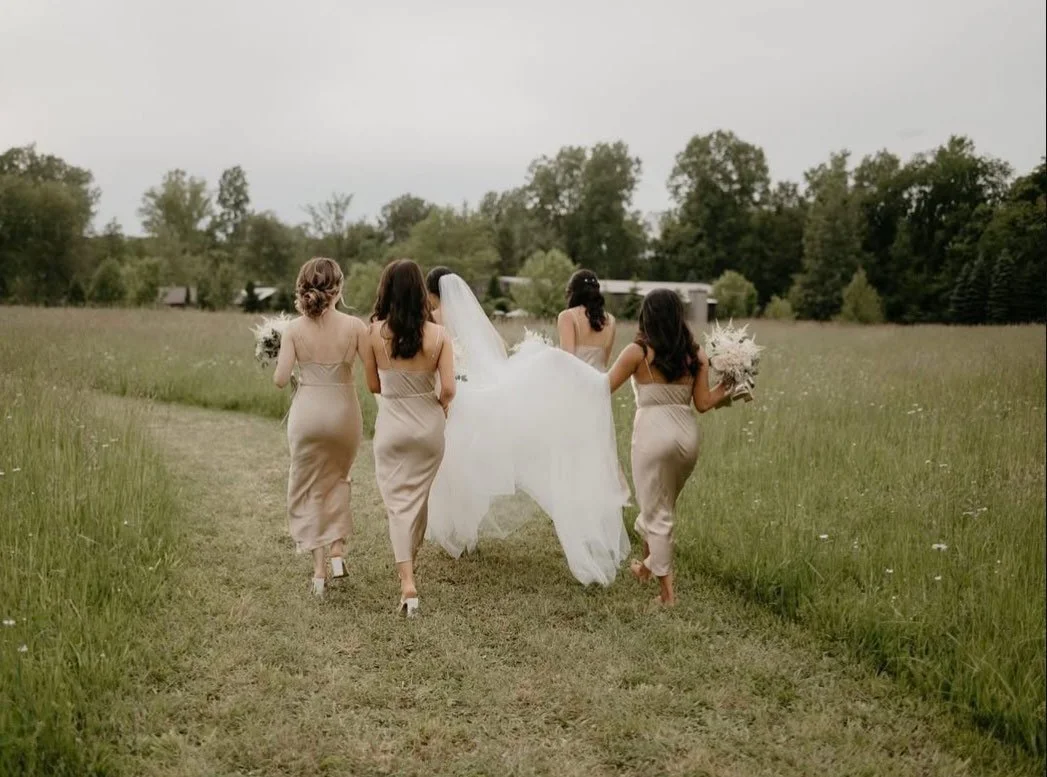 Bride-Bridesmaids-Outdoor-Field-Grass.jpg