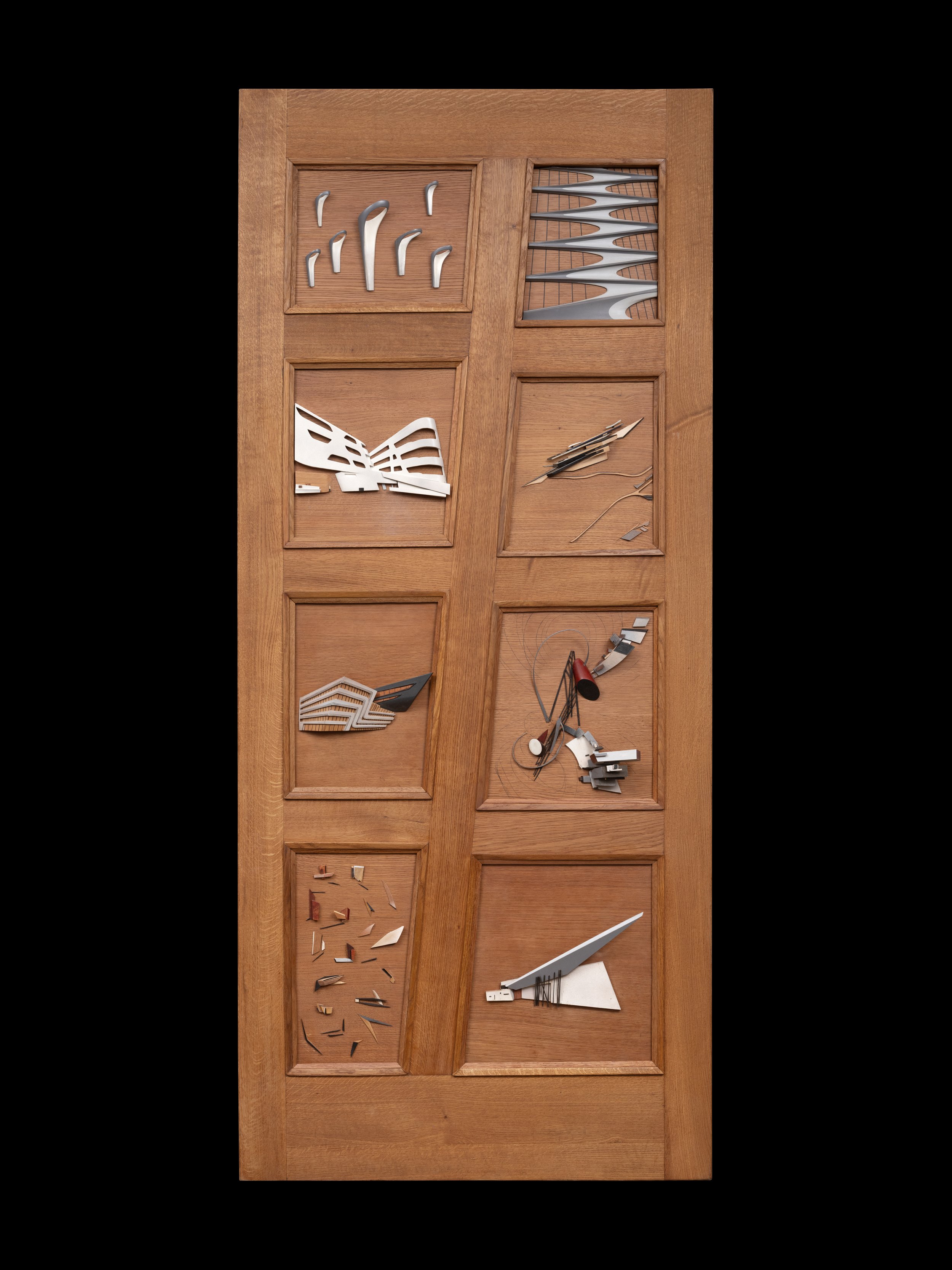 A commendation door to Zaha Hadid's early drawings to her later buildings. Made in quarter-sawn white oak with ebony, maple, painted and stained woods.