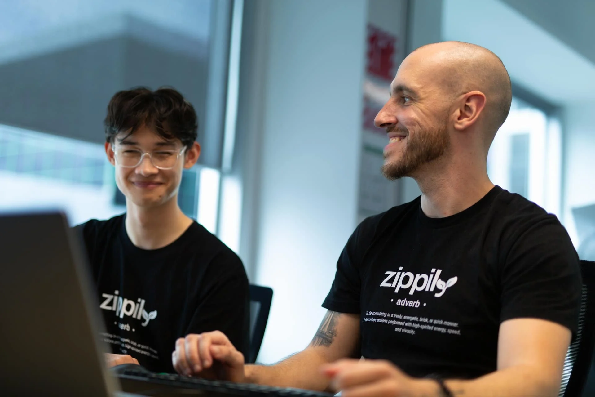 Zippily HubSpot implementation team Zac and Sean working together in Auckland New Zealand