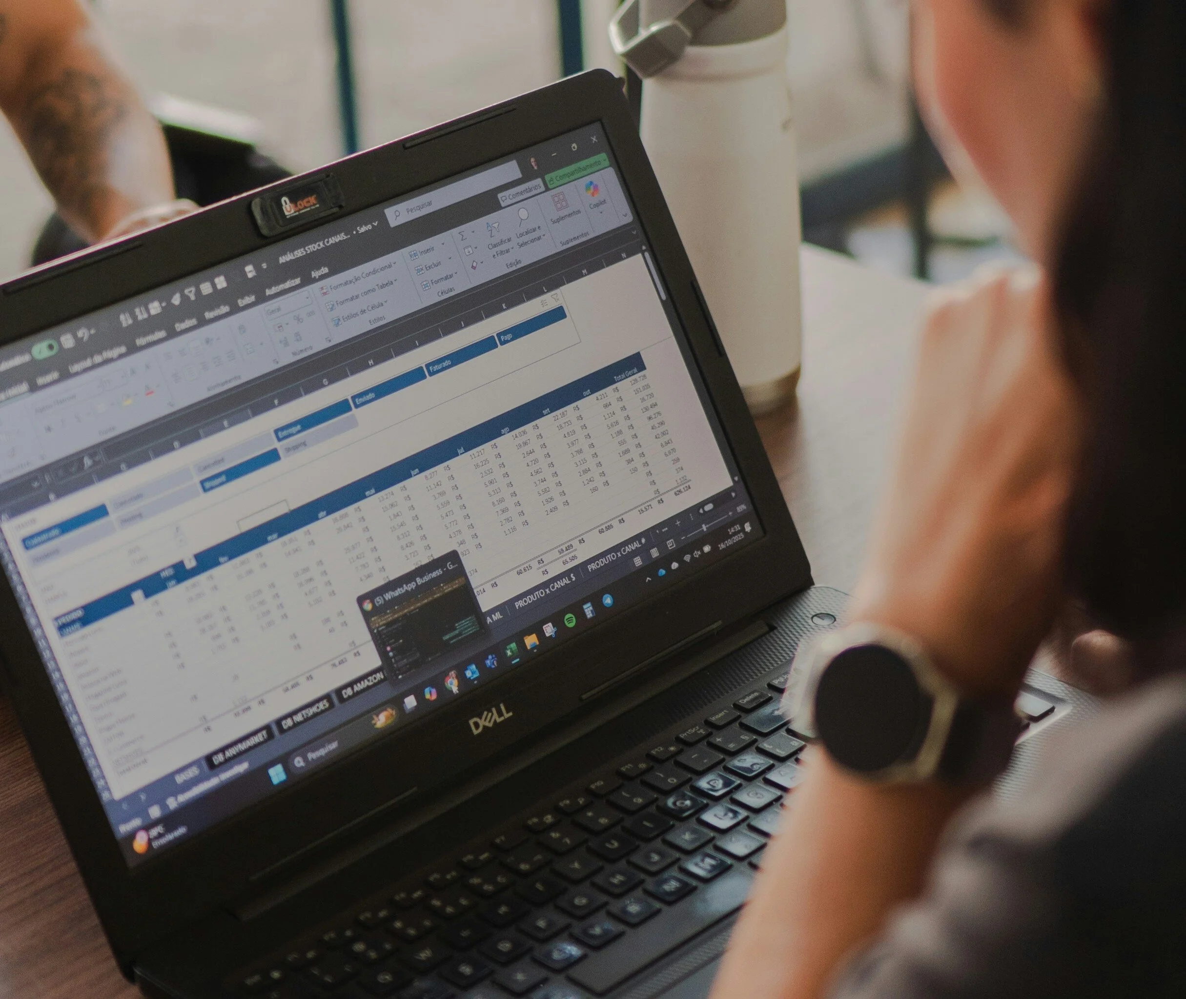 Financial adviser working on a spreadsheet-heavy laptop screen, illustrating the limitations of manual data entry for complex financial advice