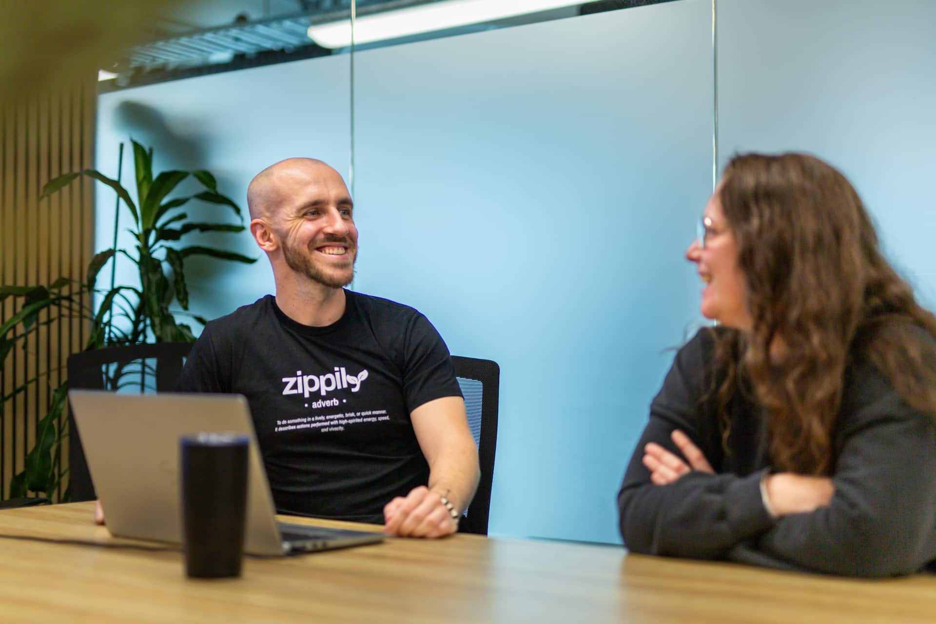 Zippily consultant discussing client goals during HubSpot strategy meeting.