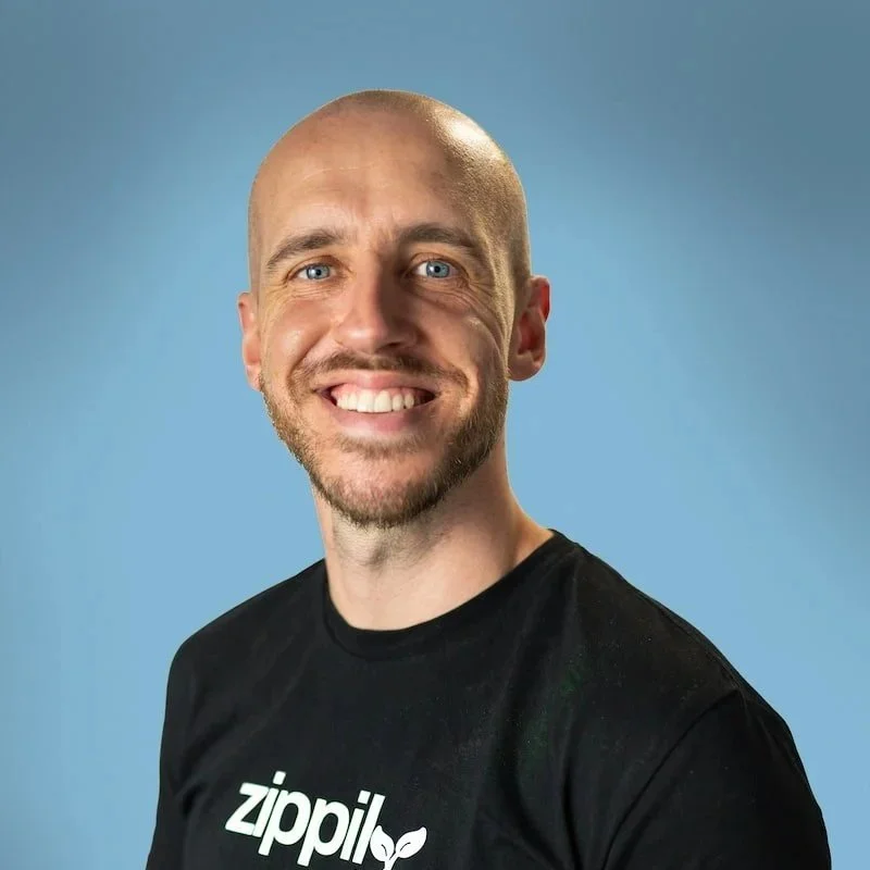 Sean Towson, founder at Zippily and HubSpot specialist, smiling in team headshot.