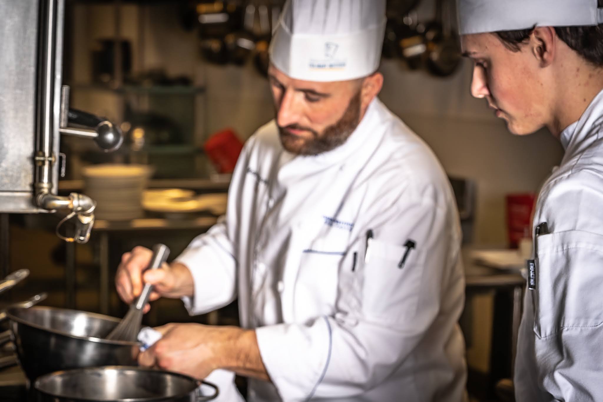 Chef Nathan Koscielski teaching students at the Niagara Falls Culinary Institute