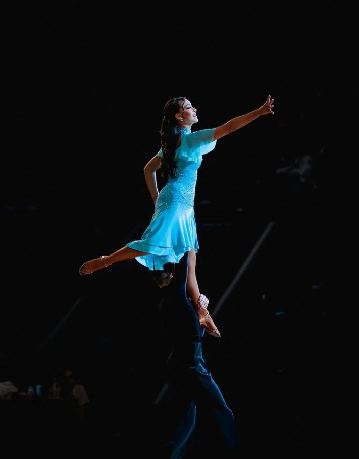 Picture was taken in march 2023 at the Amateur National Ballroom Championships 2023. The picture is of Logan Barnes and Katey Cox dancing their routine She Used to Be Mine. This was their theater arts/cabaret piece. They won the national Championship