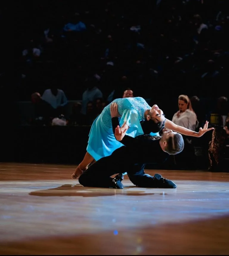 Picture was taken in march 2023 at the Amateur National Ballroom Championships 2023. The picture is of Logan Barnes and Katey Cox dancing their routine She Used to Be Mine. This was their theater arts/cabaret piece. They won the national Championship
