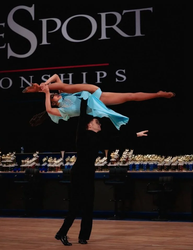 Picture was taken in march 2023 at the Amateur National Ballroom Championships 2023. The picture is of Logan Barnes and Katey Cox dancing their routine She Used to Be Mine. This was their theater arts/cabaret piece. They won the national Championship