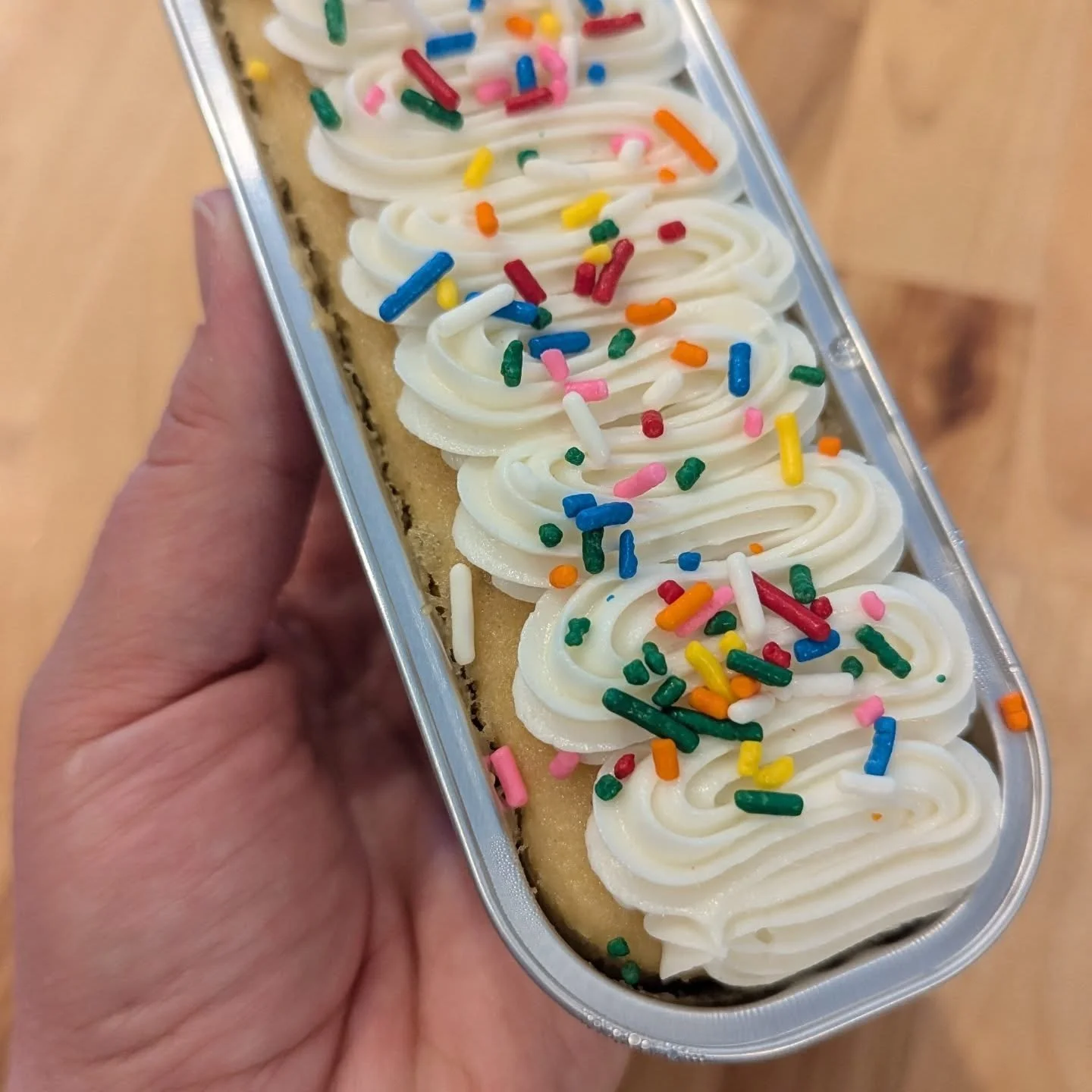 Mini cakes are so much fun!  Easy, customizable, scrumptious... There are so many different options!  This day I made Vanilla Birthday Cake, Double Dark Chocolate, and Cookies and Cream. 

I feel like the coordinated pan color to each flavor was a wi
