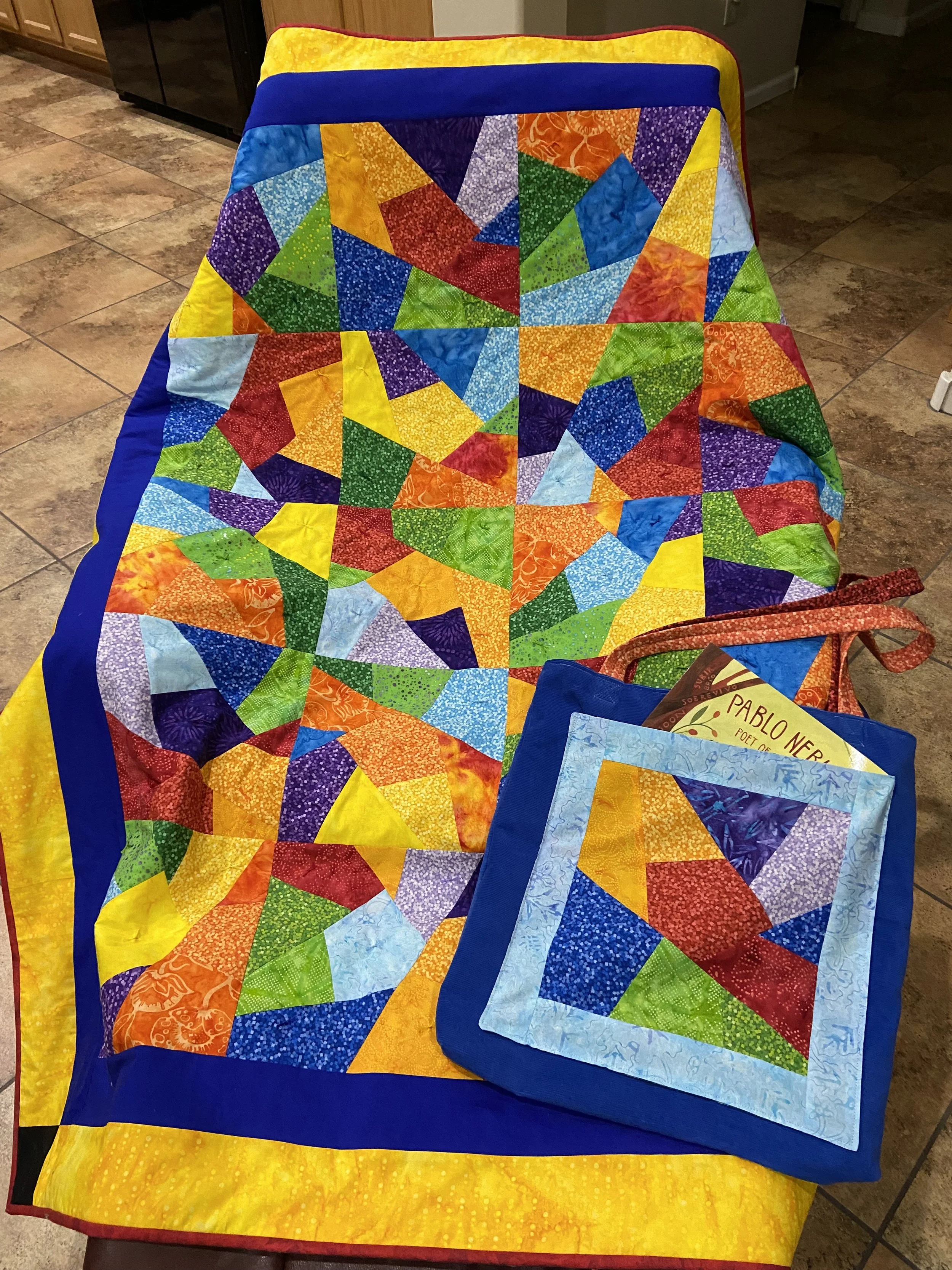Vitral (stained glass pattern) is one of the quilts given to the children at Casa Alitas.