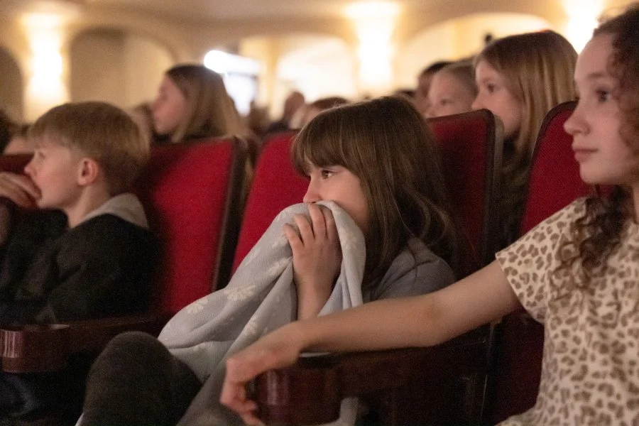 Students enjoying field trip at Fischer Theatre