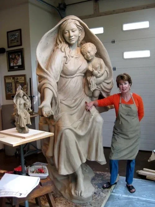 Working on Madonna & Child, clay