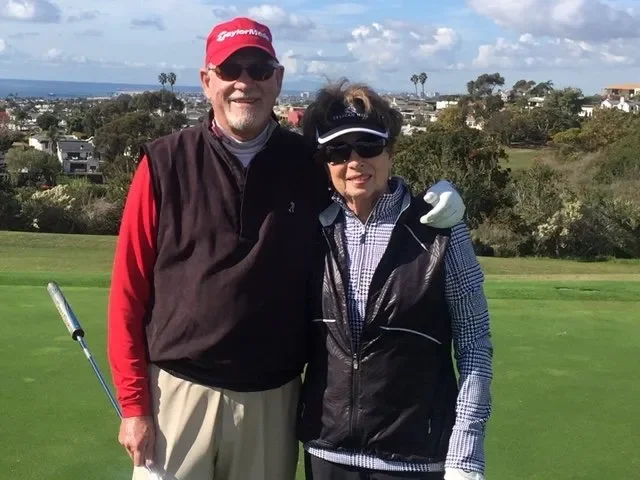 Rosalind & Hal playing golf