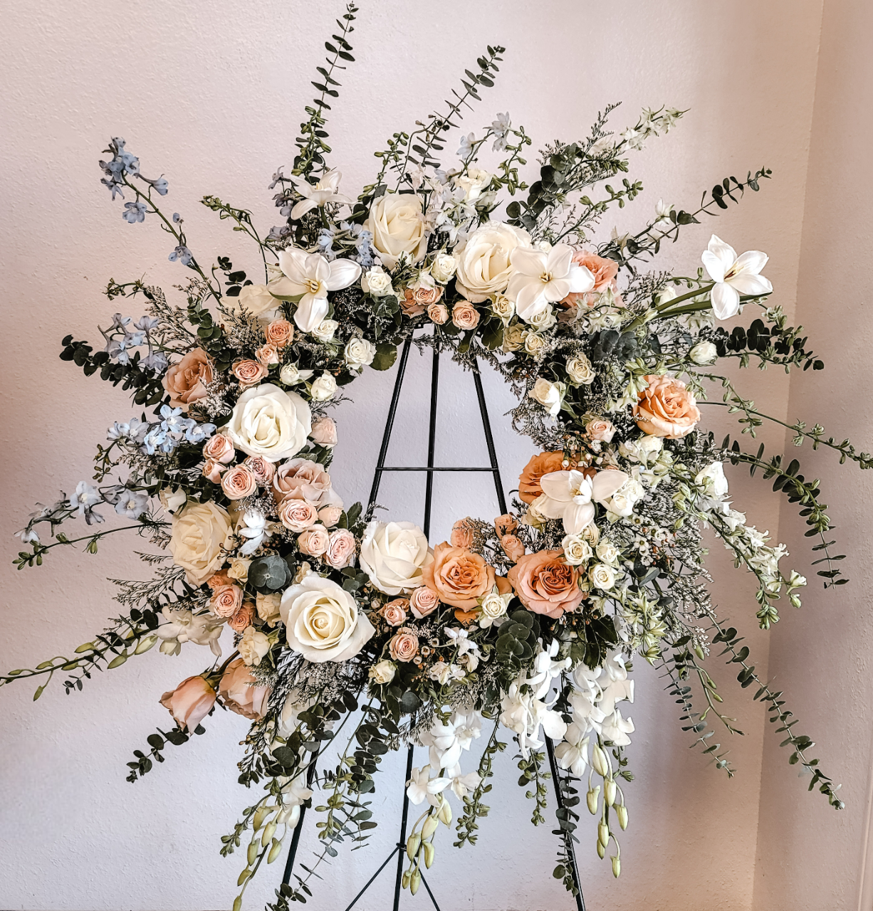 elegant and bespoke sympathy wreath standing spray for funerals in Modesto