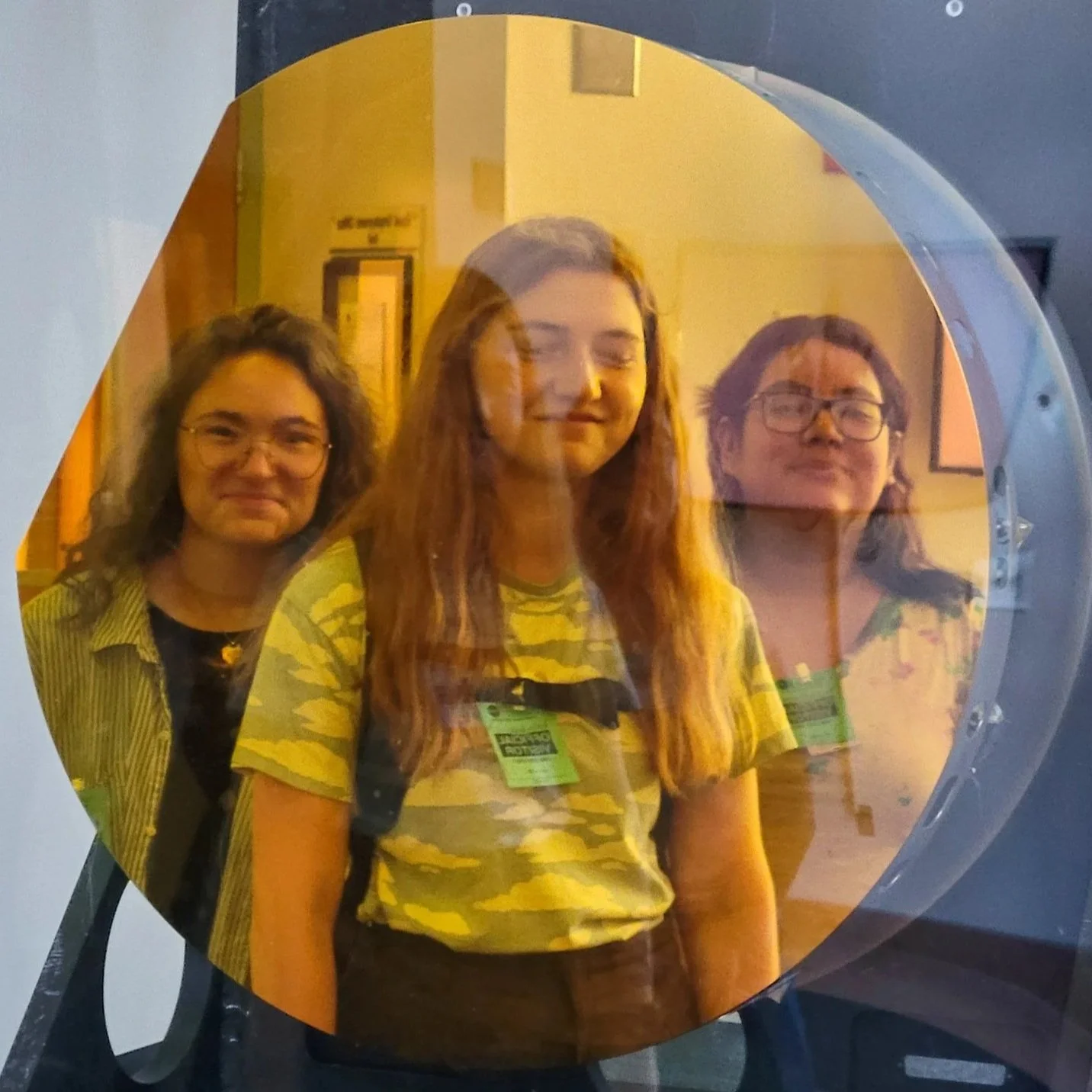 Julia Sherman'25, Alejandra Rodriguez'25, and Evyn Lally'27 in from the Roman Space Telescope model at the NASA Goddard.