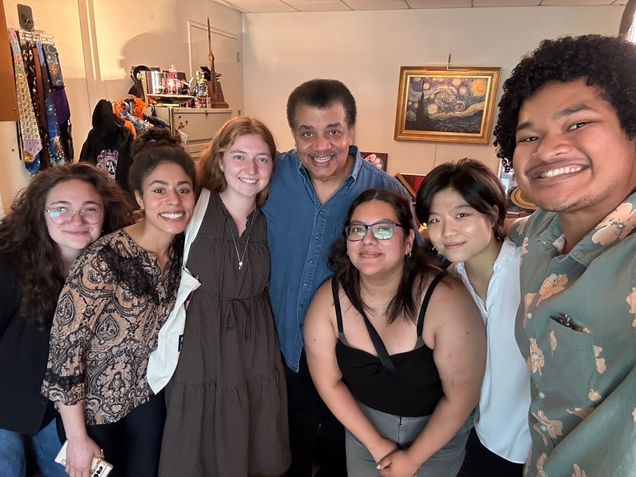 Julia Sherman'25, Alejandra Rodriguez'25, Evyn Lally'27, Peirong (Vivi) Li'26 meeting with Dr. Neil deGrasse Tyson at the American Museum of Natural History with students from CUNY Masters-Bridge program.
