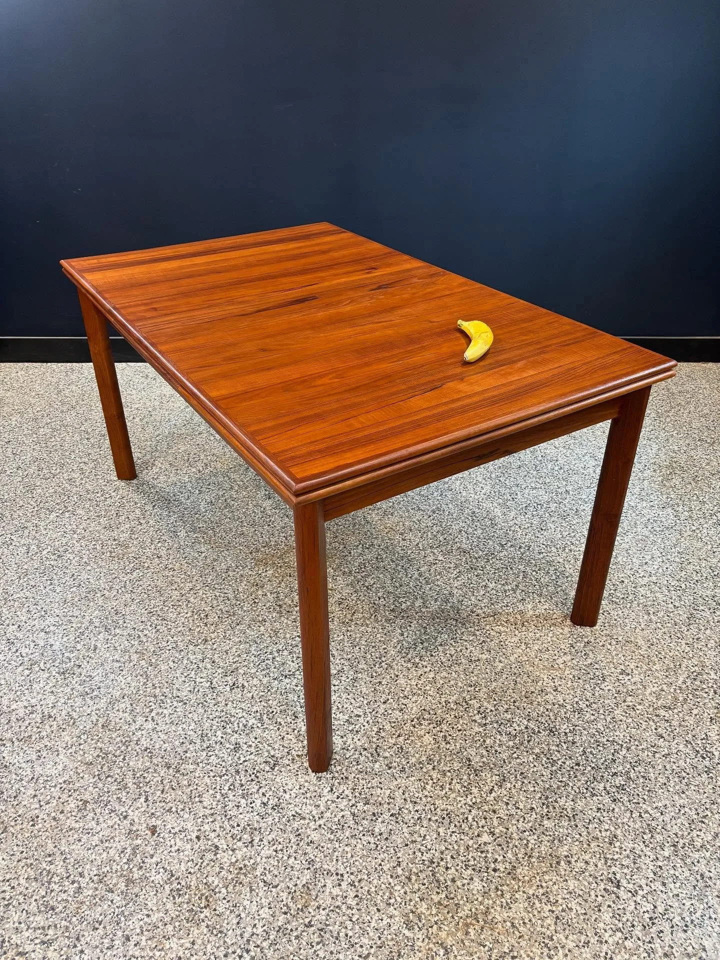 Restored vintage 1960&rsquo;s Mid Century Danish Modern BRDR Furbo teak draw leaf dining table. ⁣
⁣
Seats a roomy six or a tight eight. Fully restored and ready for dinner. ⁣
⁣
Banana for scale. ⁣
⁣
96.5 W x 35.5 D x 29 H with leaves extended⁣
Apron 
