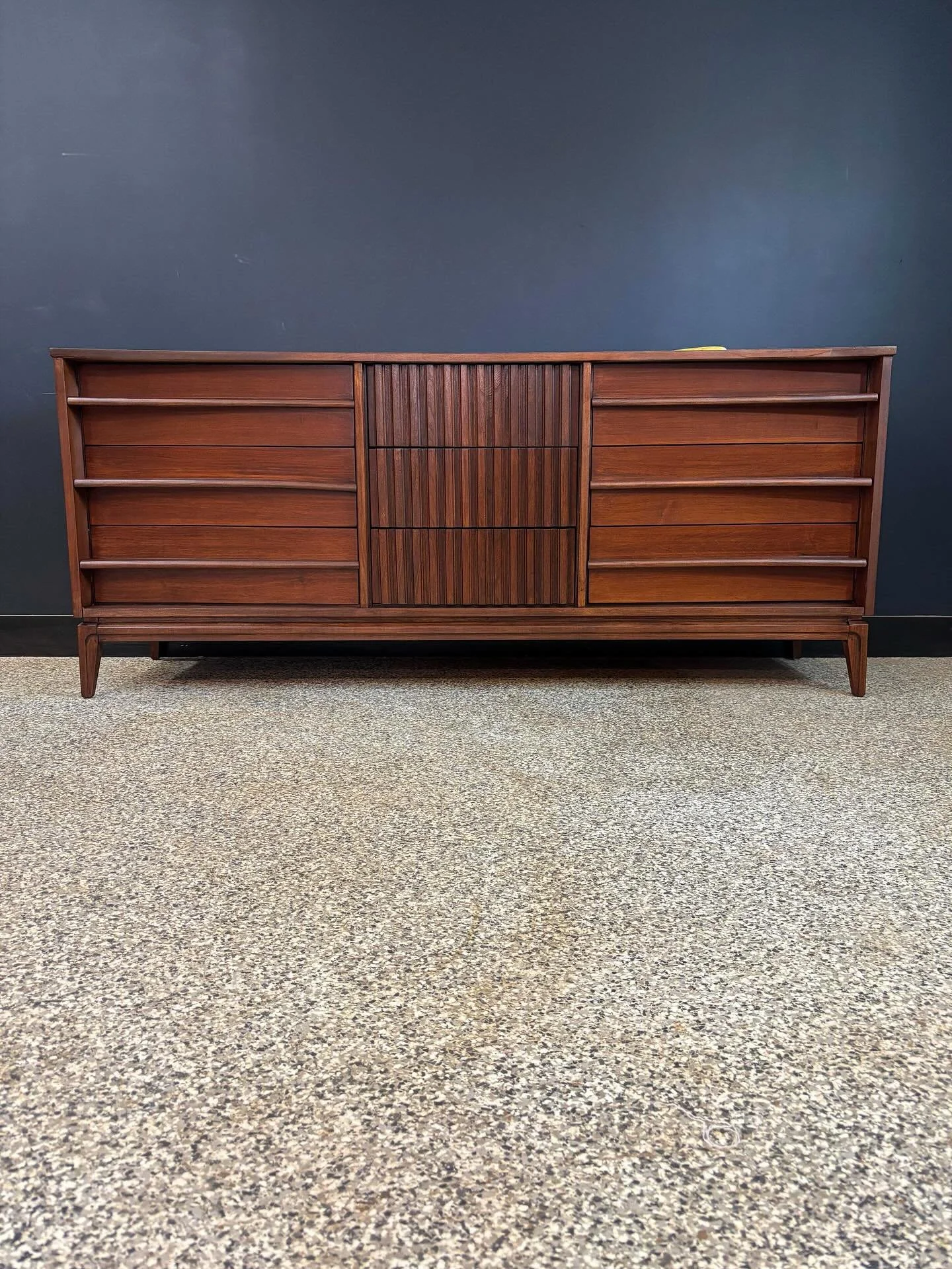 Restored vintage 1960&rsquo;s Mid Century Modern concave front nine drawer triple dresser credenza. Unmarked. ⁣
⁣
Concave front, sweet details, and a lot of storage. She&rsquo;s big. Fully restored and drawers glide smoothly. ⁣
⁣
Matching gentleman&r