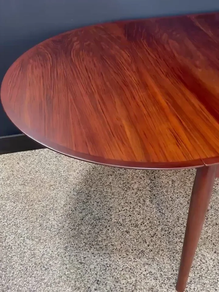 Restored vintage 1960&rsquo;s Mid Century Danish Modern Arne Vodder for George Tanier by Sibast Mobler model 227 rosewood oval drop leaf expanding dining table. ⁣
⁣
Fully restored and what a dreamboat. Seats eight to ten. Two big leaves and a center 
