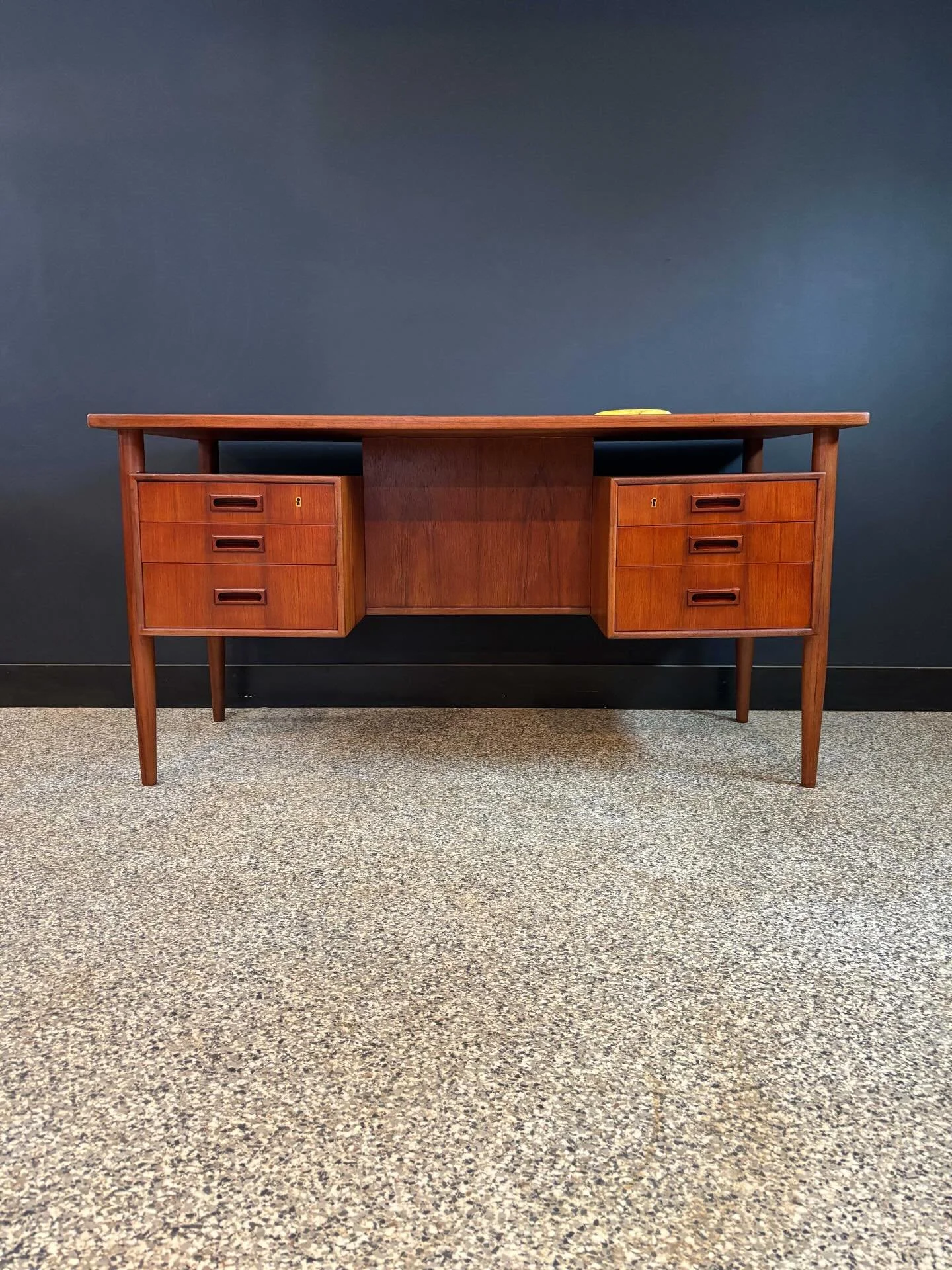 Restored vintage 1970&rsquo;s Mid Century Danish Modern HP Hansen teak floating top executive desk. ⁣
⁣
Drawers in front, bookcases on the back. Lots of surface area and storage. ⁣
⁣
Banana for scale. ⁣
⁣
57 W x 27.5 D x 29.5 H⁣
Keyhole 20 W⁣
⁣
Pick-