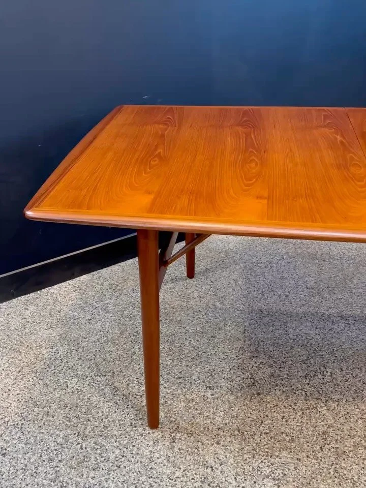 Restored vintage 1960&rsquo;s Mid Century Danish Modern teak expanding surfboard dining table. Unmarked. ⁣
⁣
Uncommon, lovely legs, fully restored, and quite a looker. Seats ten with both leaves in. ⁣
⁣
Banana for scale. ⁣
⁣
119 W x 43 D x 29 H with 