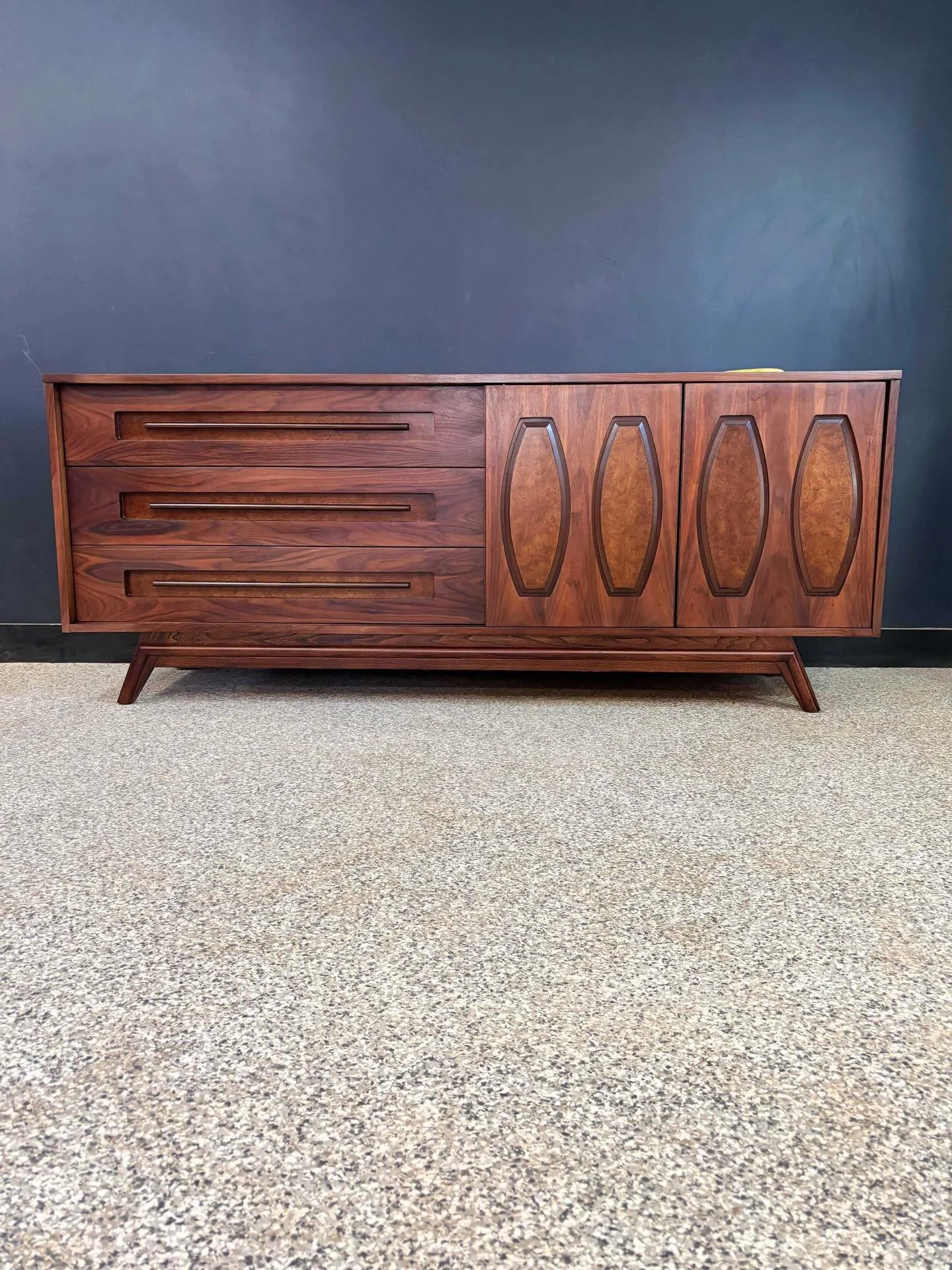 Restored vintage 1960&rsquo;s Mid Century Modern Young MFG walnut &amp; Burl wood nine drawer triple dresser and mirrors. ⁣
⁣
Fully restored and drawers glide smoothly. Mirrors attach to back of dresser. An absolute beast; big, large, and tons of sto