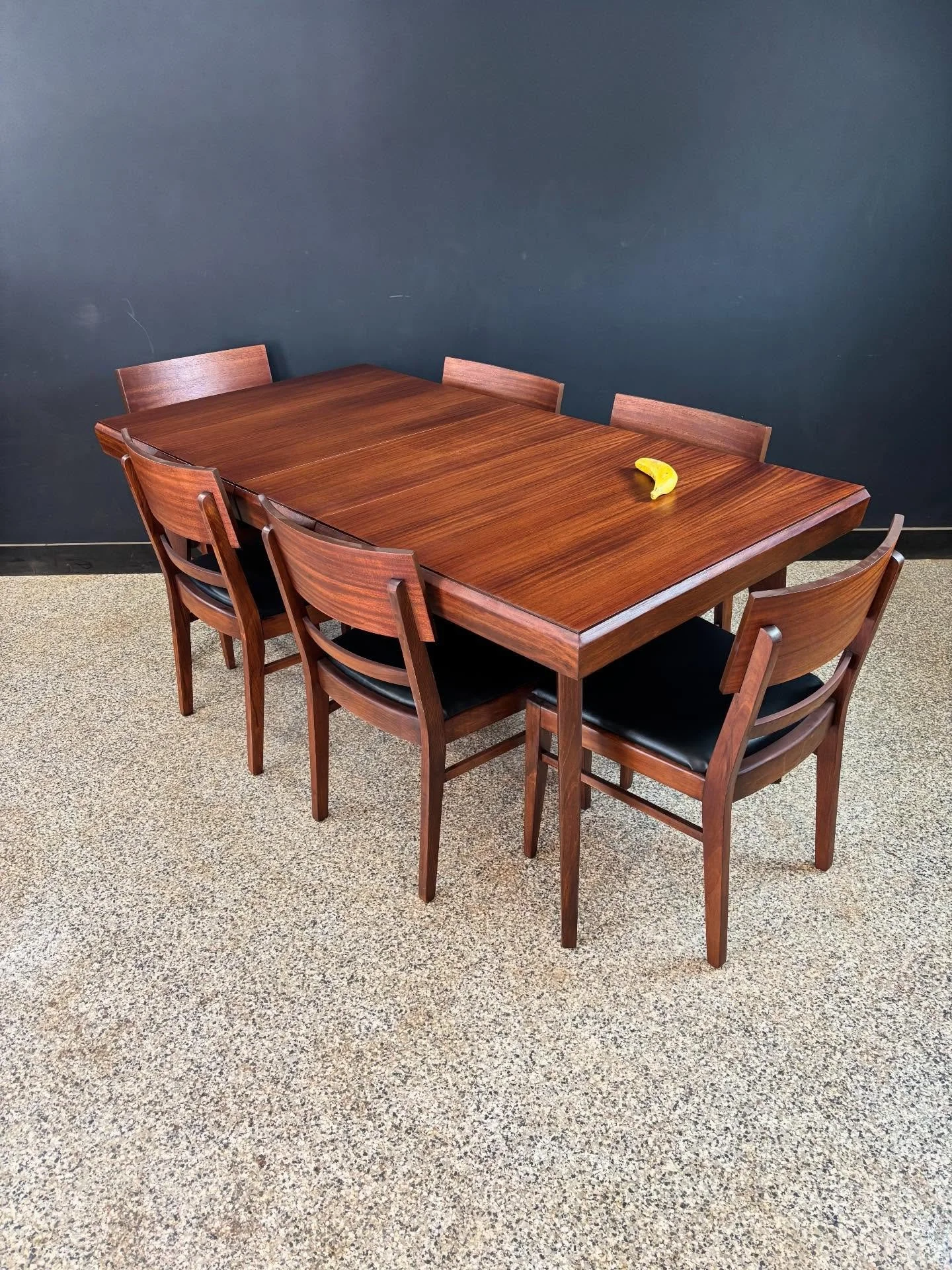 Restored vintage 1950&rsquo;s Mid Century Modern mahogany expanding dining table &amp; six chairs. Unmarked. ⁣
⁣
Tables has five legs and one leaf. Chairs are five sides and a captain. ⁣
⁣
Fully restored and ready for dinner. Seats six with and four 
