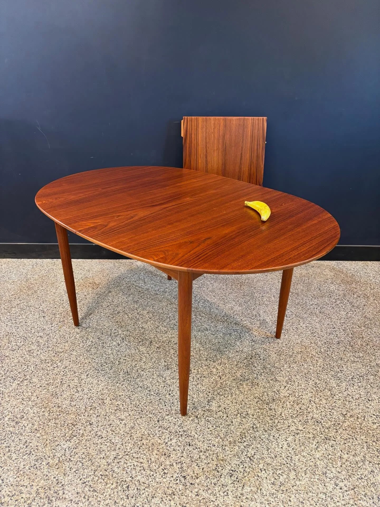 [sold] Restored vintage 1960&rsquo;s Mid Century Danish Modern teak oval expanding dining table. Unmarked passed the made in Denmark stamp, but in the style of Peter Hvidt at least. ⁣
⁣
Seats four to six. Lovely. ⁣
⁣
Banana for scale. ⁣
⁣
77 W x 39.5