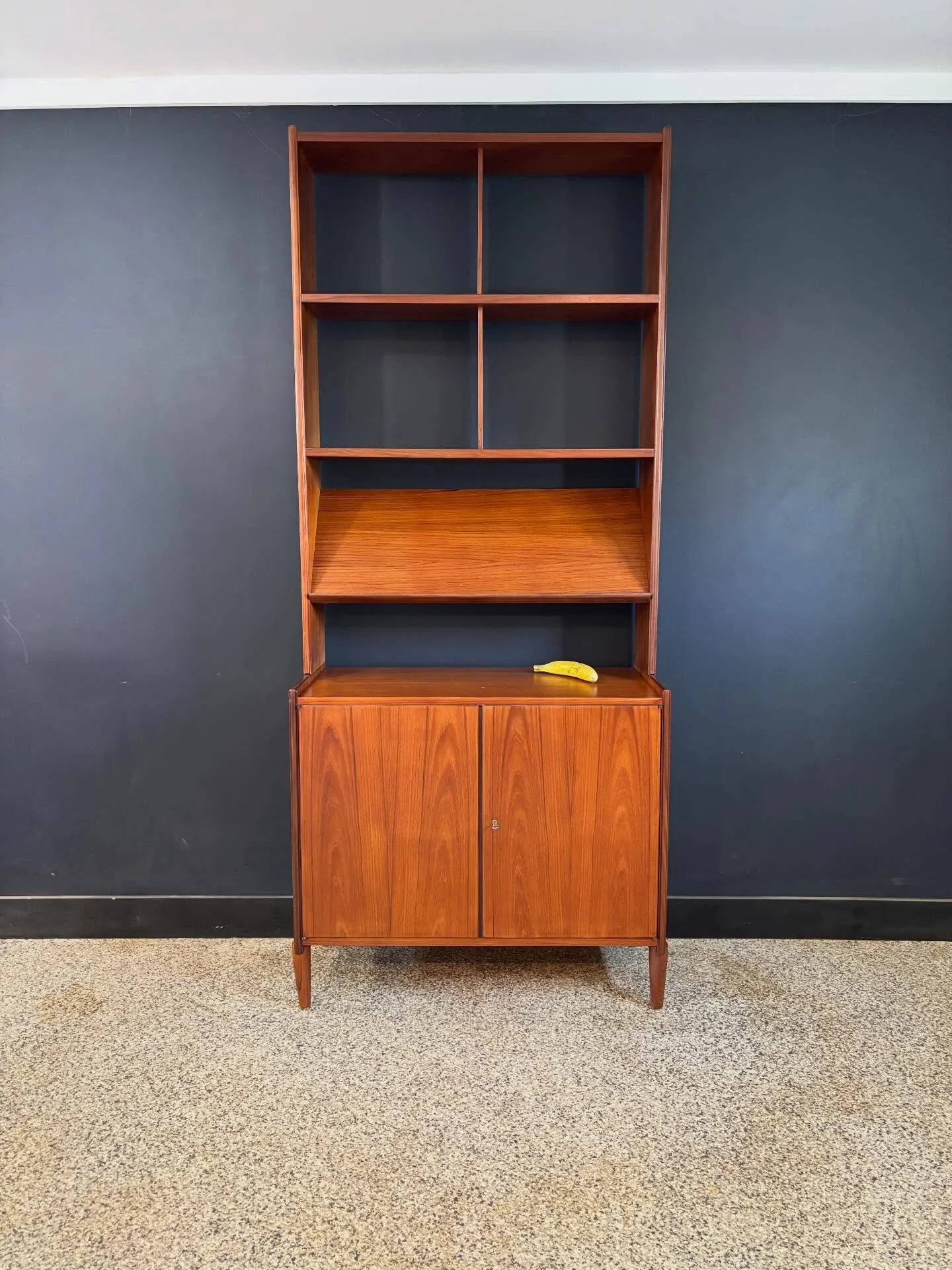[sold] Restored vintage 1960&rsquo;s Mid Century Danish Modern teak single bay two-piece free-standing record &amp; stereo cabinet wall unit. Unmarked. ⁣
⁣
Teak with rosewood detailing. Two door cabinet fits records and stereo components. Upper shelv