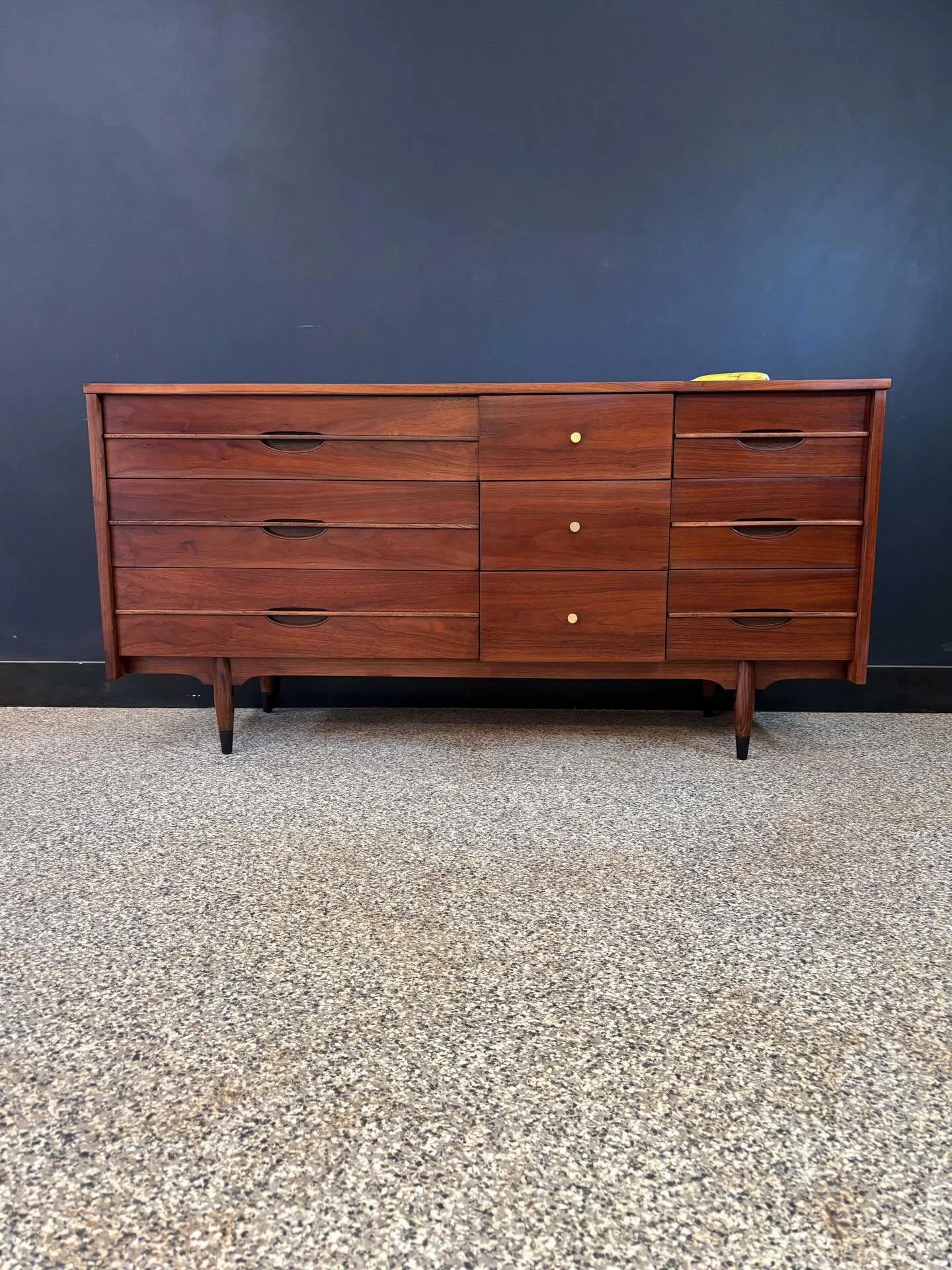 [sold] Restored vintage 1960&rsquo;s Mid Century Modern Mainline by Hooker walnut nine drawer triple dresser. ⁣
⁣
Nine drawers in a six drawer size. She&rsquo;s compact. ⁣
⁣
Banana for scale. ⁣
⁣
62 W x 18 D x 31 H⁣
⁣
Pick-up in Beverly, MA or local 