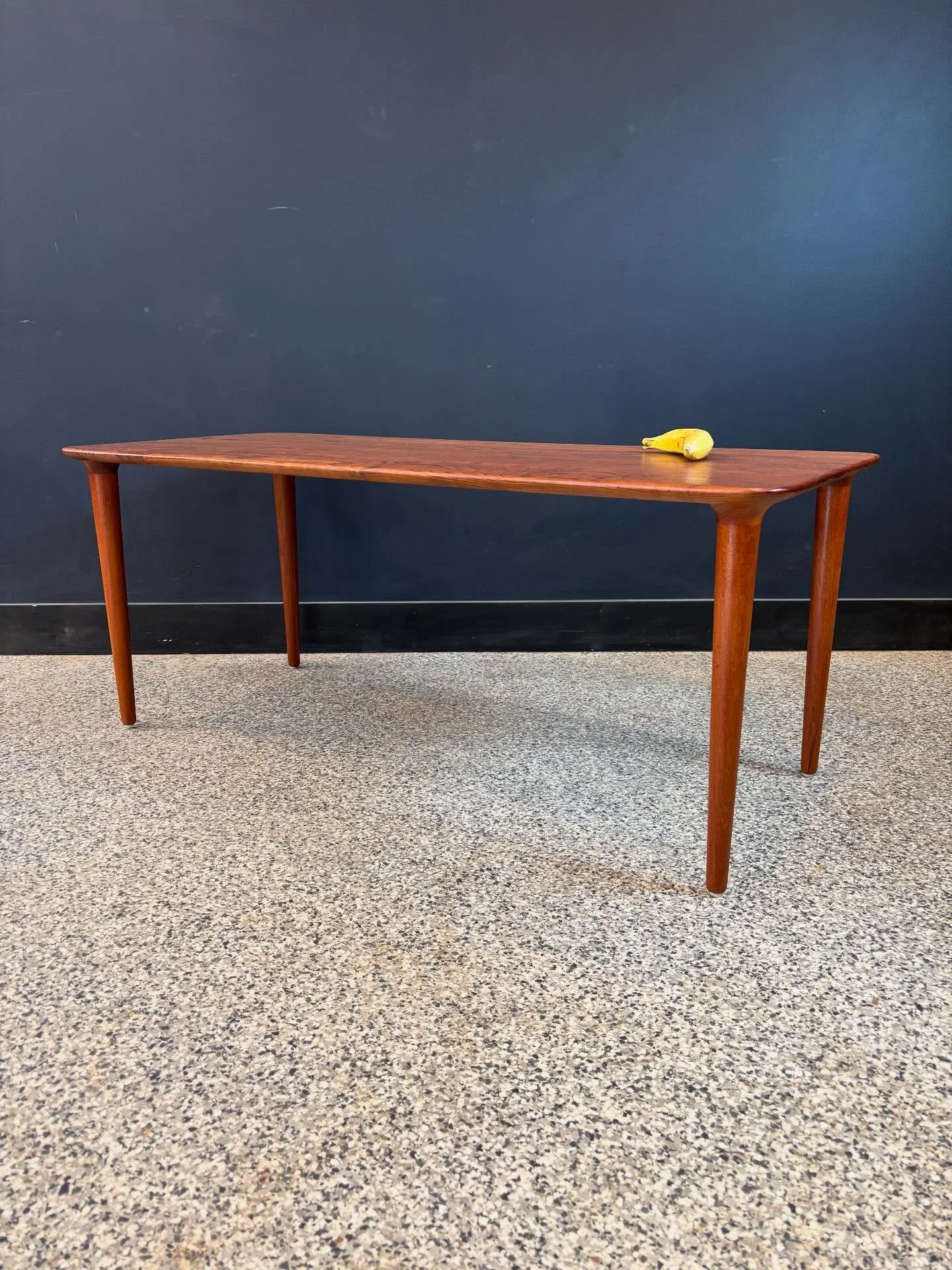 Restored vintage 1950&rsquo;s Mid Century Danish Modern Rolf Rastad &amp; Adolf Relling for Gustav Bahus solid teak coffee table. Made in Norway. ⁣
⁣
Sculptural and dainty, and a bit taller than average. ⁣
⁣
Banana for scale. ⁣
⁣
48 W x 21.75 D x 20 
