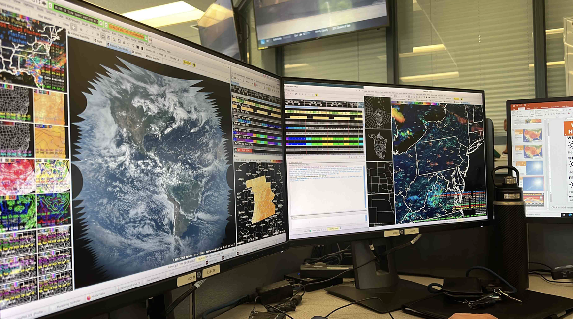 The dizzying array of windows on a typical National Weather Service forecaster’s workstation. Meteorologists sift constantly through hundreds of data sources to fine-tune predictions, as I saw when I embedded with a local-office meteorologist.