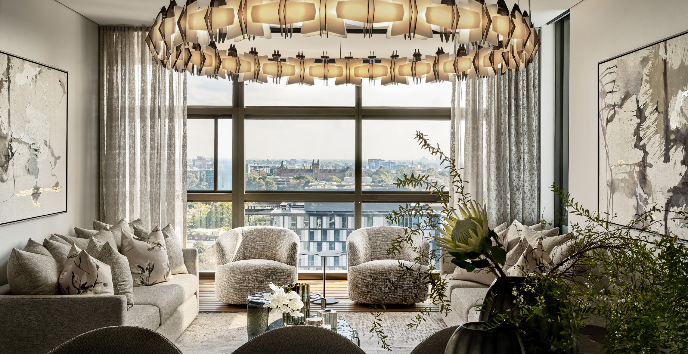 Light-filled luxury living room featuring bespoke linen sofas and curated textures by Mandy Alice, Interior Designer Byron Bay