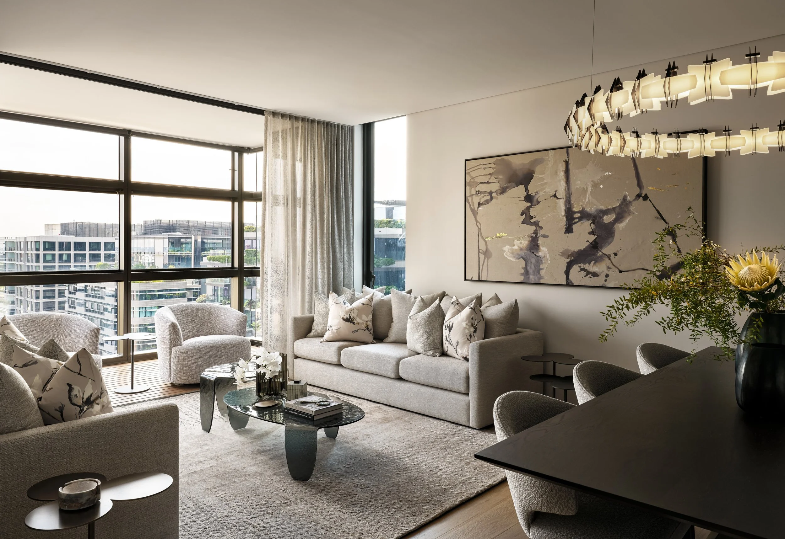 Luxury penthouse living room with Sydney city views by Mandy Alice, Byron Bay interior designer — curated furnishing, Chippendale Sydney.