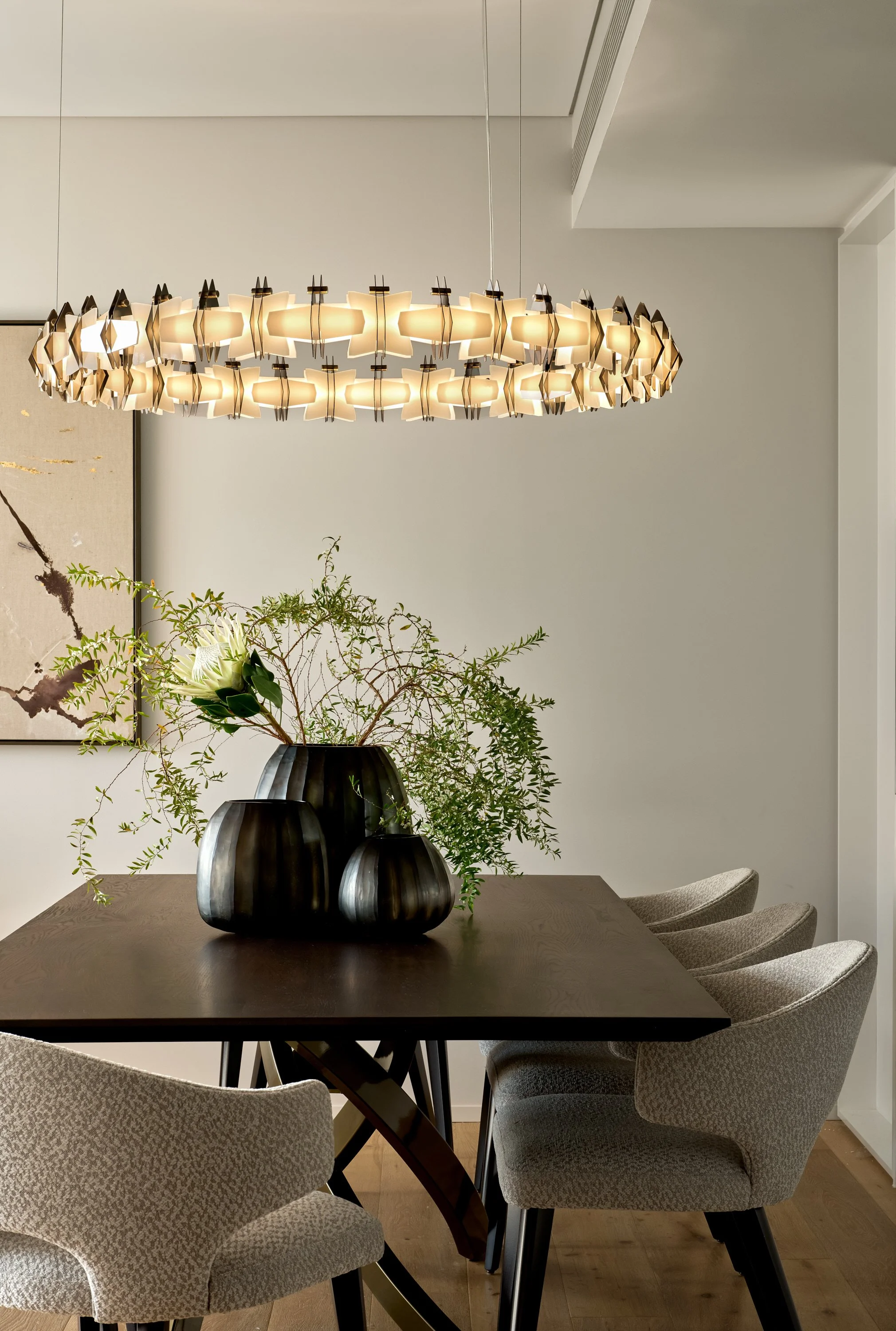 Luxury penthouse dining room with statement chandelier by Mandy Alice, Byron Bay interior designer — bespoke styling, Chippendale Sydney.