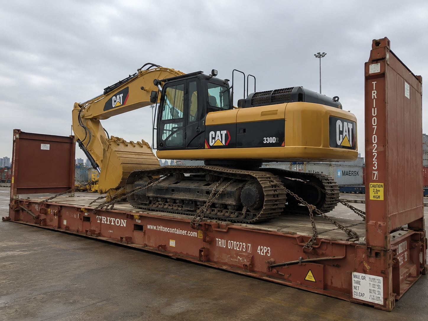 Heavy equipment loaded for international shipping to Libya