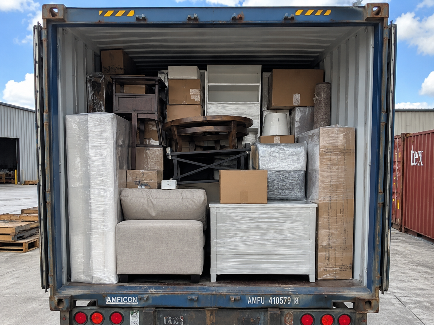 Household goods packed inside shipping container to El Salvador