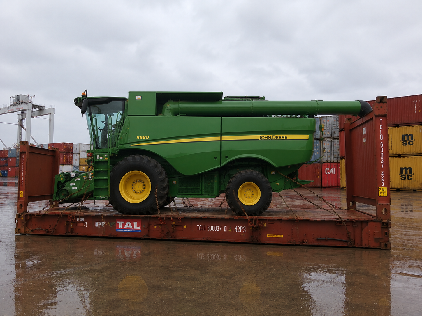 Heavy machinery shipping to Poland from the USA with construction equipment, industrial machinery, tractors, and oversized cargo ready for export