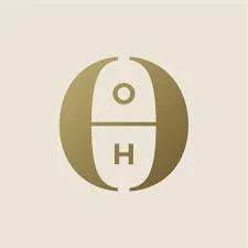 Minimalist logo featuring the letters O and H in gold on a beige background.