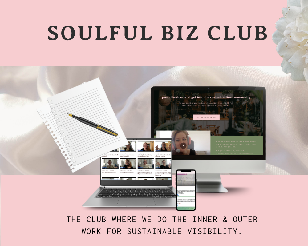 A promotional graphic for SOULFUL BIZ CLUB featuring a pink background with black text, a desktop computer, a laptop, a smartphone displaying videos, a pen on lined paper, and white flowers, with a tagline promoting inner and outer work for sustainable visibility.
