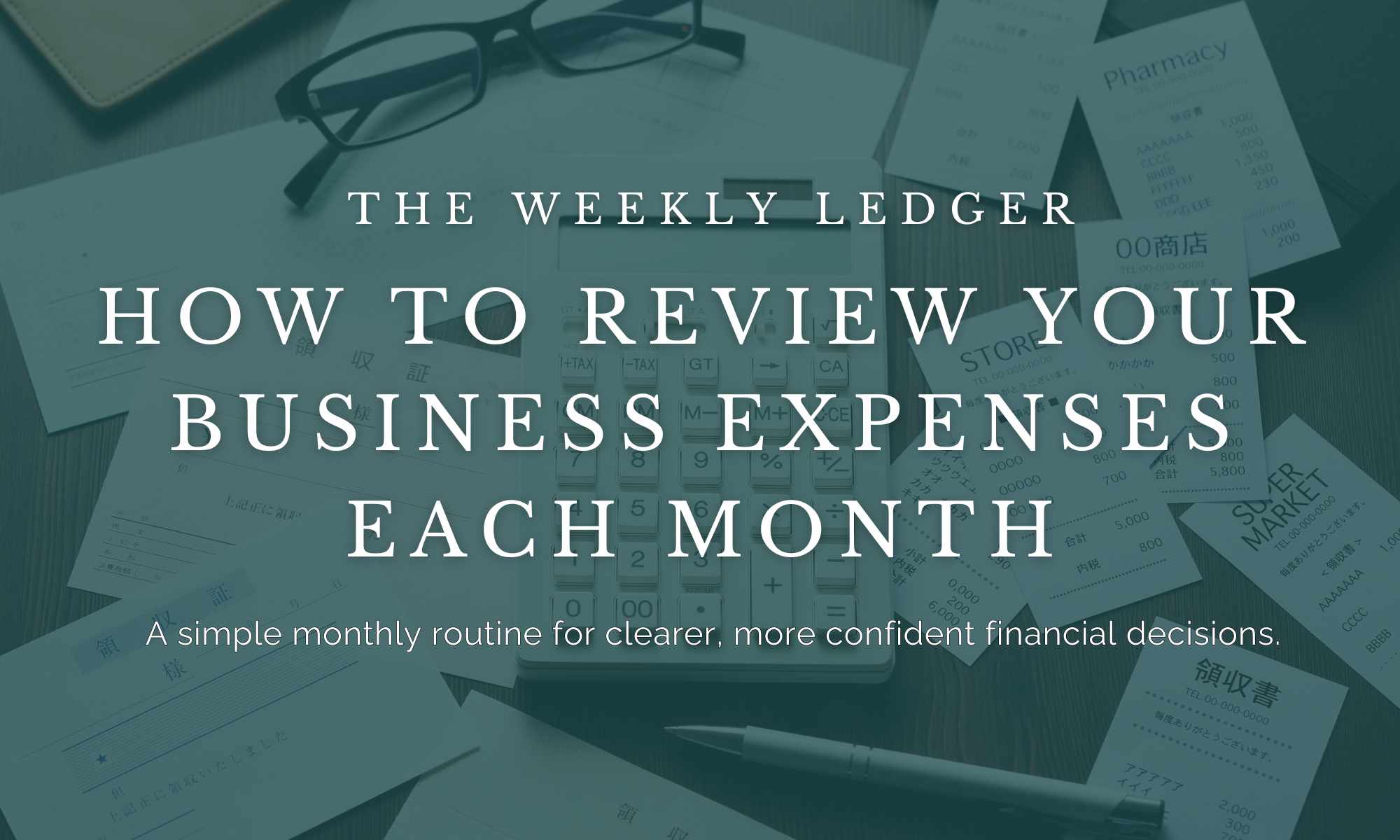Small business owner reviewing monthly business expenses and bookkeeping records