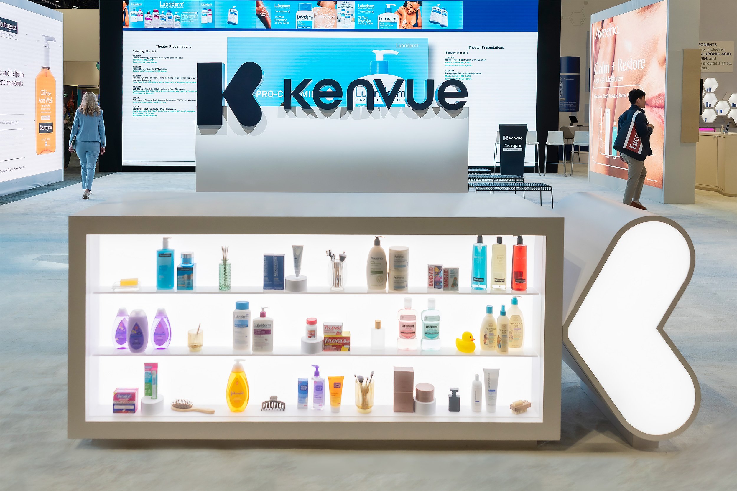 Display shelf with skincare and personal care products, including bottles, tubes, and boxes, in a retail setting.