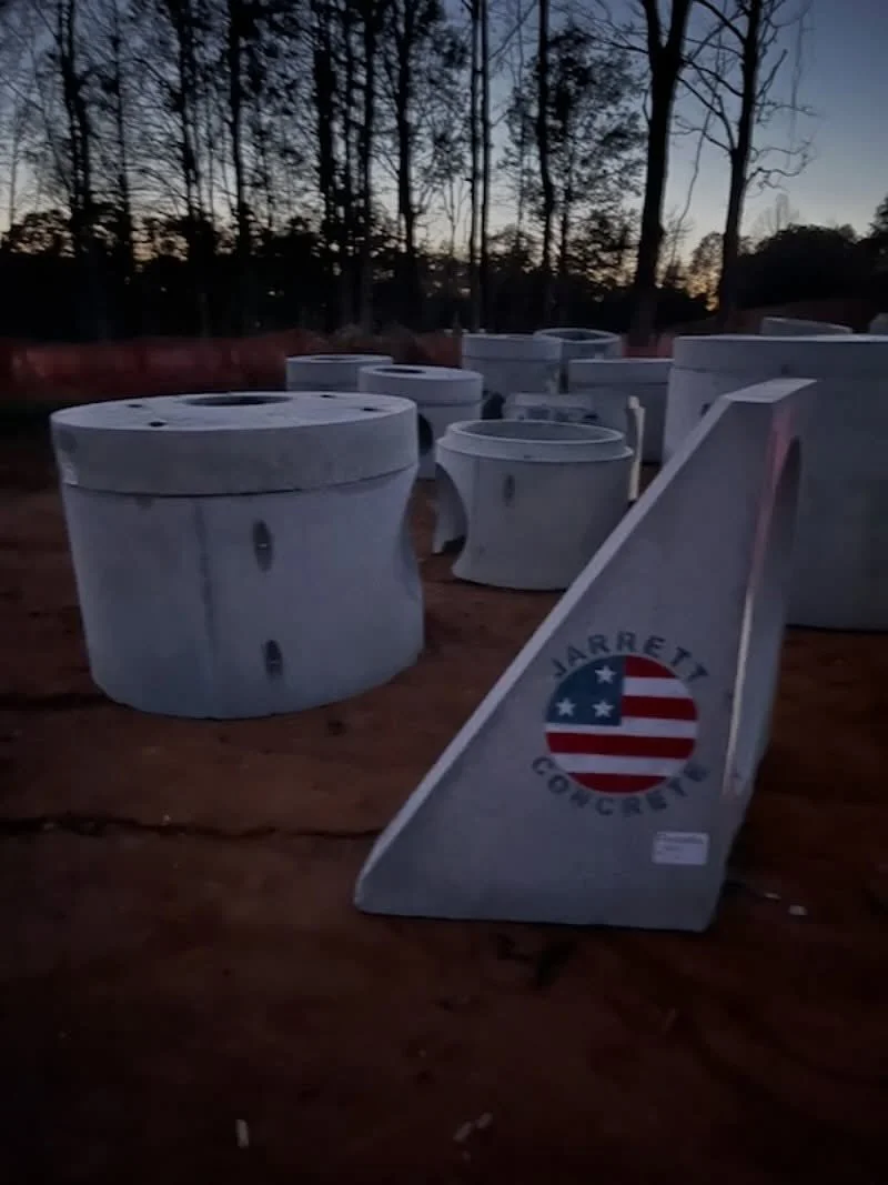 &ldquo;Built for the Boys That Get It Done.&rdquo;

Sun&rsquo;s not even up, and these structures are already clocked in.
Jarrett Concrete &mdash; the stuff that holds the whole job together.