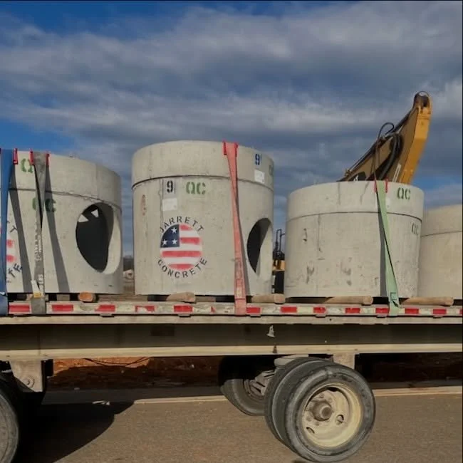 When it comes to quality concrete products, we don&rsquo;t cut corners &mdash; we deliver them.
From the yard to the jobsite, these precast structures are built tough, hauled safe, and ready to work. 🏗️

Proud to put Jarrett Concrete on the road and