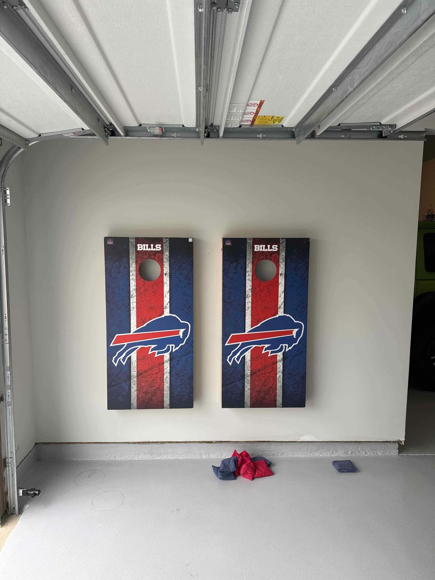 What do you get the #billsmafia🏈 client who has everything? French cleats, of course. I loved building the hanging system to get these cornhole boards off the floor and on display! 

#handyman #mtpleasantsc #CharlestonSC