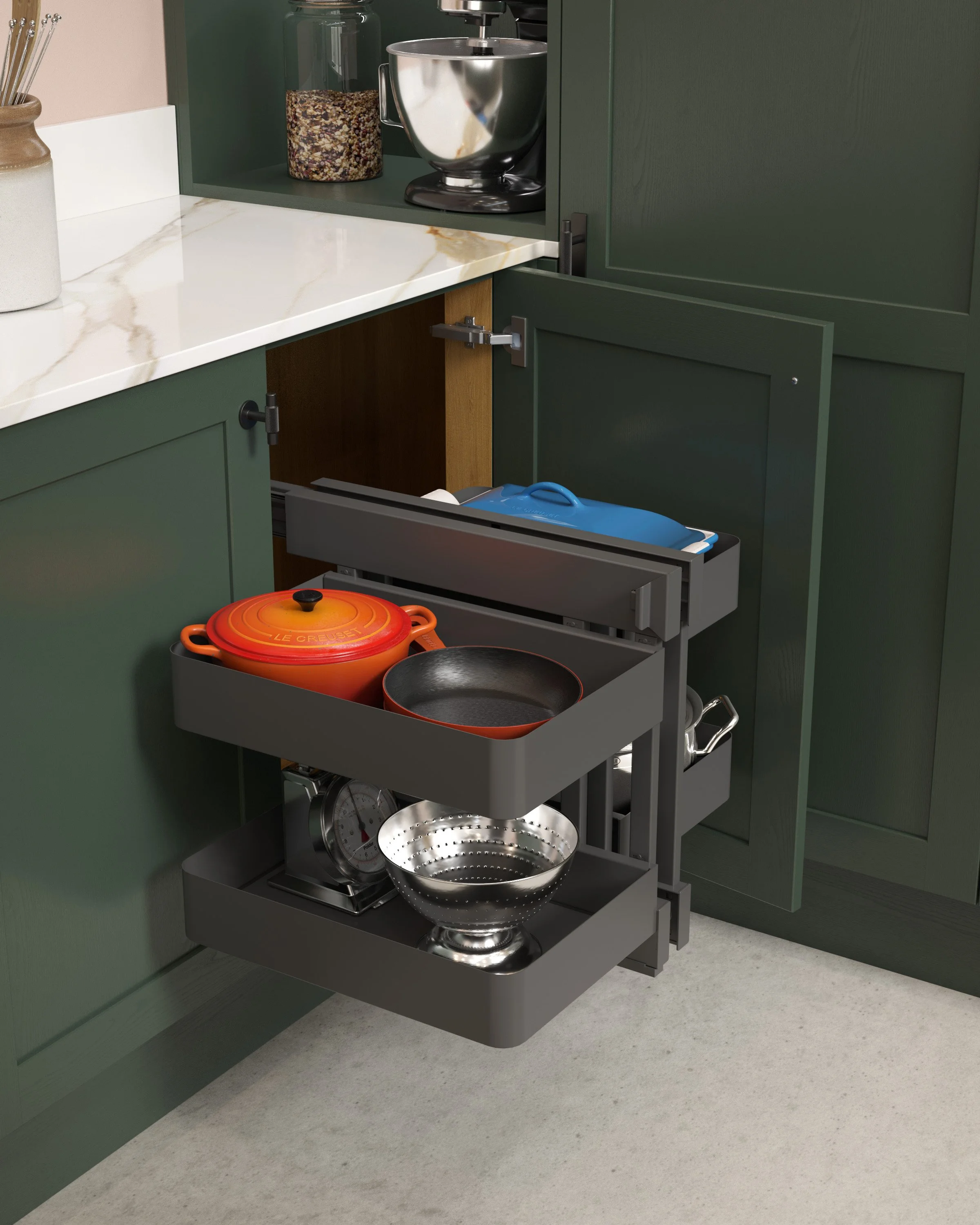 Pull-out kitchen cabinet with shelves containing a Dutch oven, frying pan, colander, and other kitchen items.