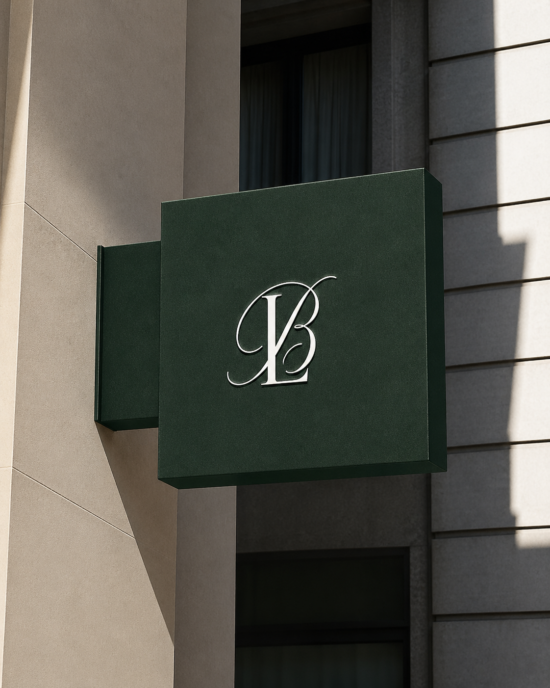 A green square sign with white ornate initials 'KB' mounted on the exterior of a building.