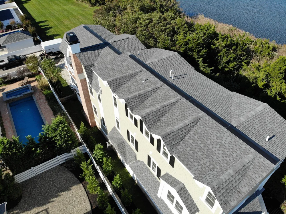 New pool beside a custom home at 4046 4th Ave, Avalon, NJ