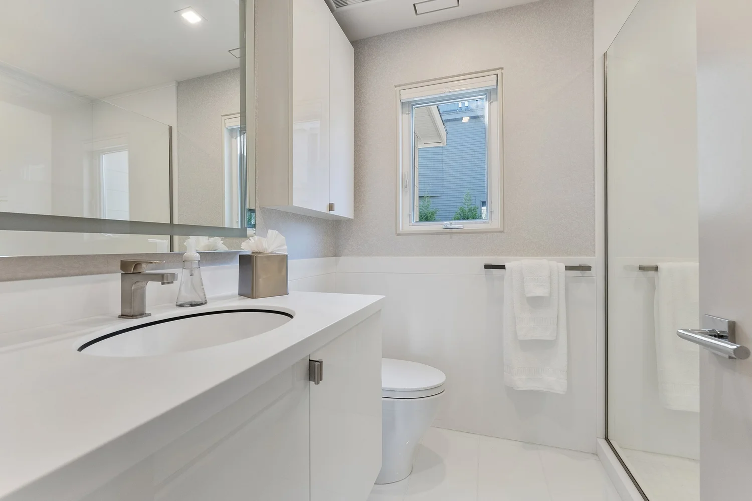 After: renovated bathroom with a new vanity and glass shower, 107 116th St, Stone Harbor, NJ