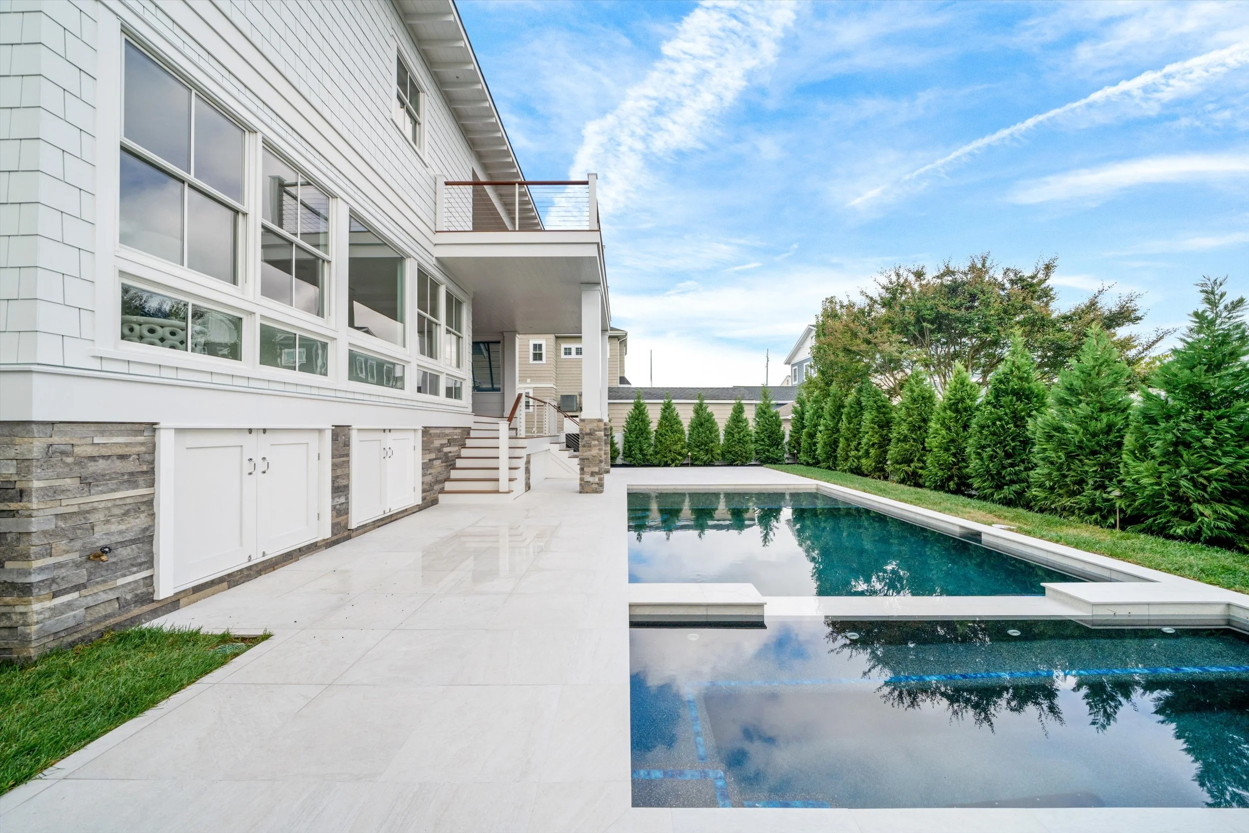 Gunite pool and spa with the house and upper deck beyond, 245 57th St, Avalon, NJ