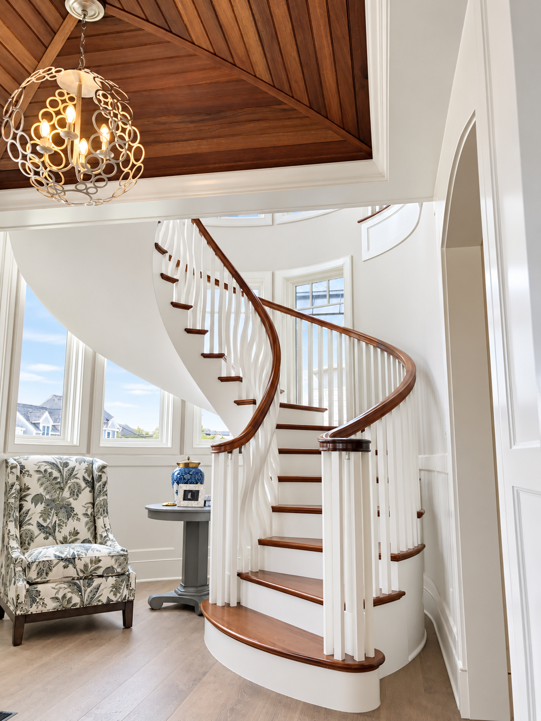 Curved staircase with mahogany handrail, Stone Harbor NJ custom home