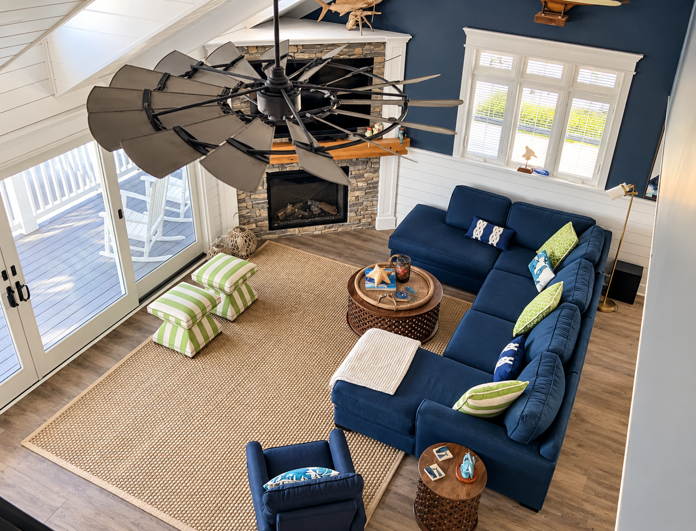 View from the loft over the living room and stone fireplace in the renovated Sea Isle City duplex